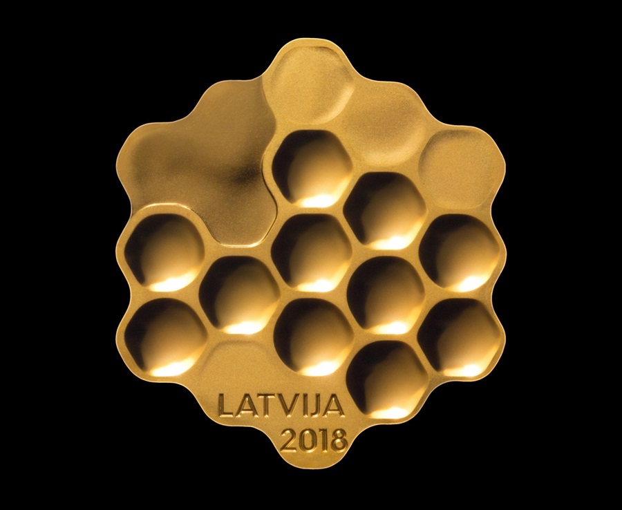 Łotewska moneta jak plaster miodu 